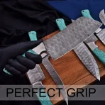 Materials: Aluminium, copper, iron, steel, wood This handcrafted 3-piece knife set features beautifully engraved Damascus-style blades and unique wooden handles with blue inlay accents. Perfect for chefs who value both artistry and performance. Includes a stylish leather carrying case. - Image 5