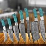 Materials: Aluminium, copper, iron, steel, wood This handcrafted 3-piece knife set features beautifully engraved Damascus-style blades and unique wooden handles with blue inlay accents. Perfect for chefs who value both artistry and performance. Includes a stylish leather carrying case.