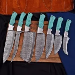 Materials: Aluminium, copper, iron, steel, wood This handcrafted 3-piece knife set features beautifully engraved Damascus-style blades and unique wooden handles with blue inlay accents. Perfect for chefs who value both artistry and performance. Includes a stylish leather carrying case. - Image 2